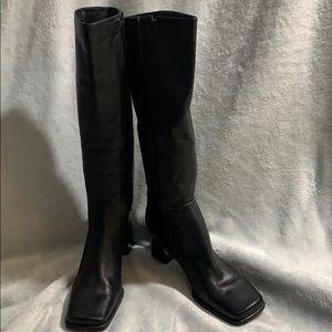 EUC black leather boots. 3”heel made in Brazil 7.5